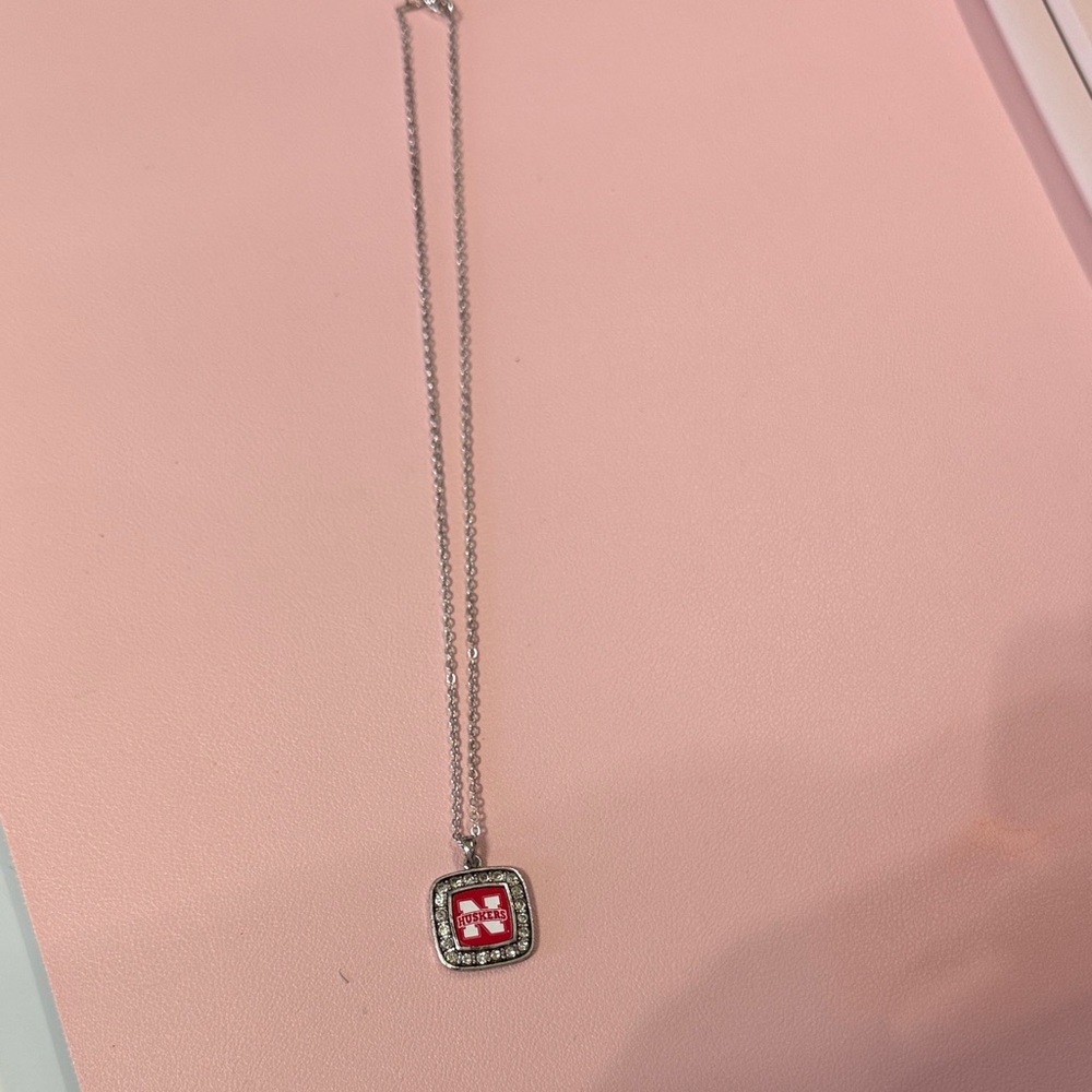 Elegant Silver Necklace with Red Pendant
